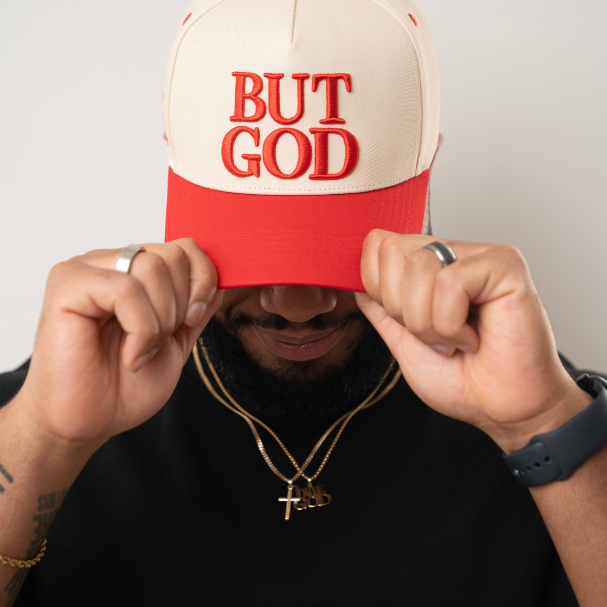 The But God, Hat